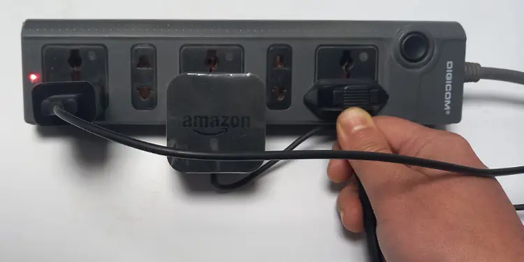 Fixed: Vizio TV Won't Turn on, Power Light Fades Off 2 remove-power-cord-of-tv-from-power-supply-1