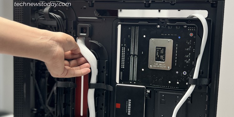 Power Supply Cable Management Tips & Tricks 4 guiding-atx-and-cpu-power-cable-from-psu