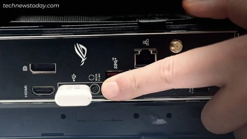 What is BIOS Flashback and How to Use It? 9 pressing-bios-flashback-button-1024x576