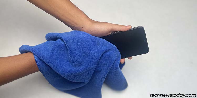 Water in Charging Port? 5 Proven Steps to Dry It Fast! 3 wipe off excess water from phone