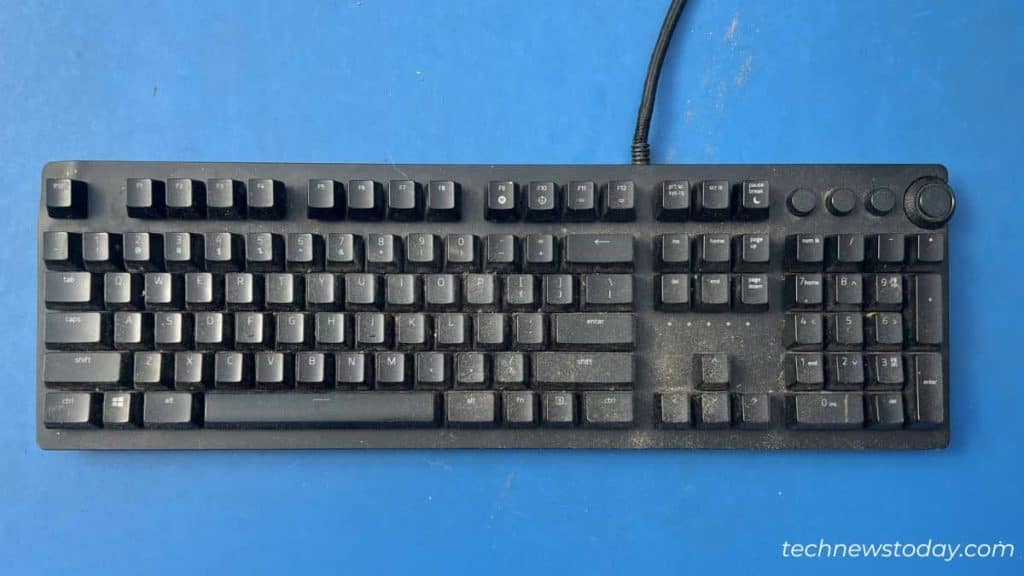 How to Clean Mechanical Keyboard in 7 Steps 1 placing dirty razer keyboard in table