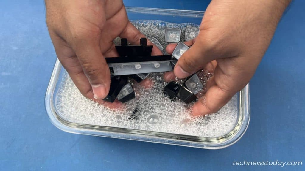 How to Clean Mechanical Keyboard in 7 Steps 5 rinse keys using detergent and water