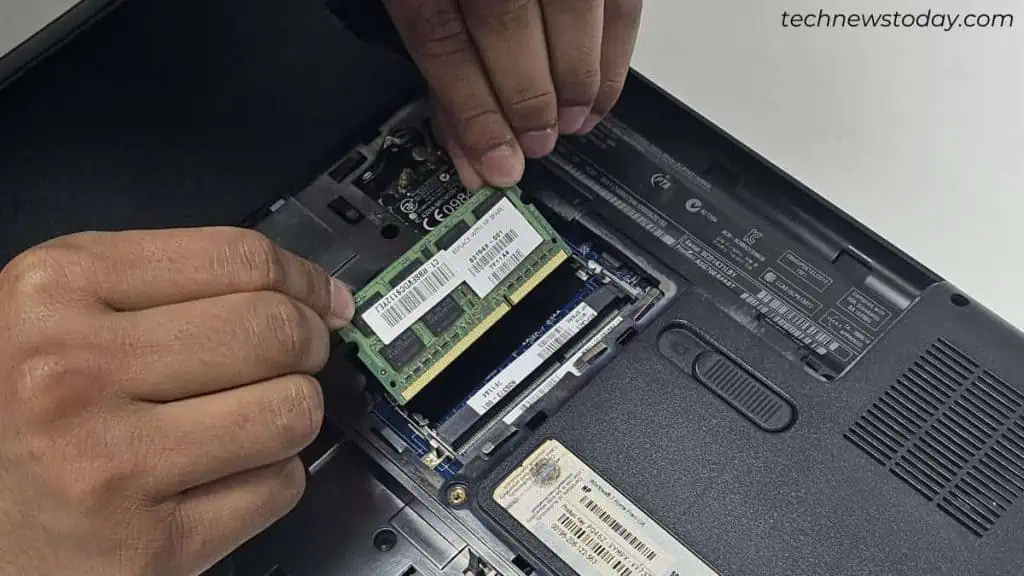 HP Laptop Won't Turn on? Here's How to Fix It 16 removing-ram-stick-from-hp-laptop-1024x576