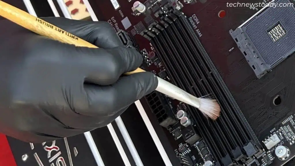 How To Clean A Motherboard 21 cleaning-dimm-slots-with-brush-1024x576