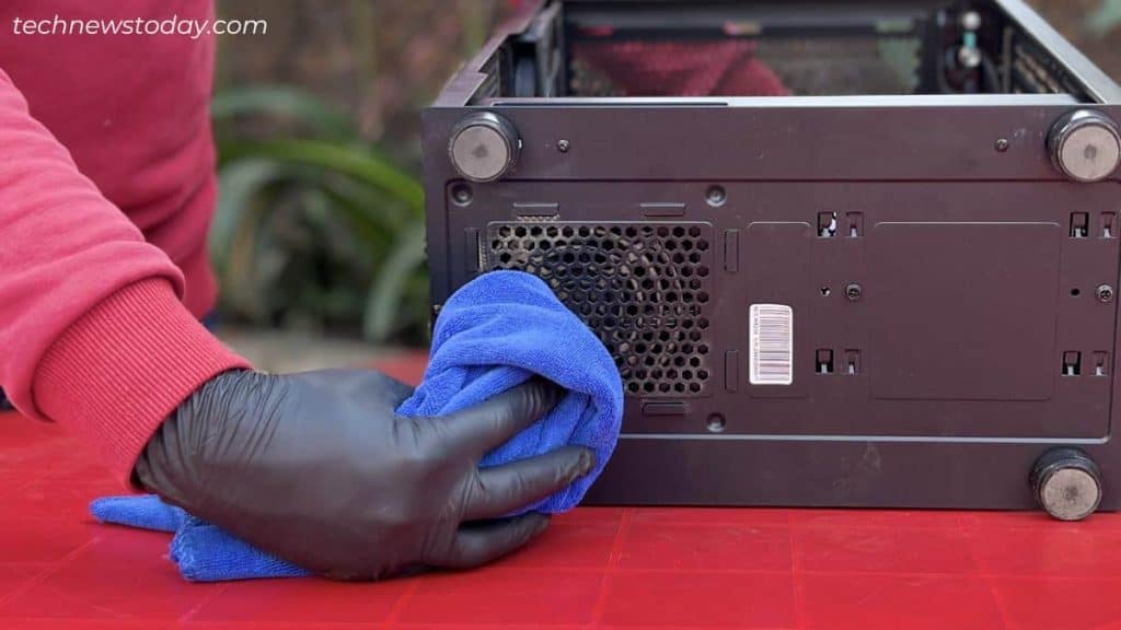 cleaning using microfiber towel bottom pc case