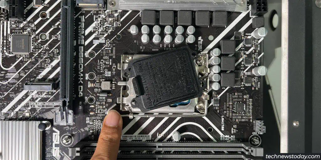 How To Install Intel CPU on Motherboard Safely 12 cpu-socket-cover-pop-off-1024x512