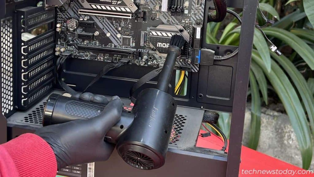 How to Clean Dust From PC 10 dusting off motherboard using compressed air duster