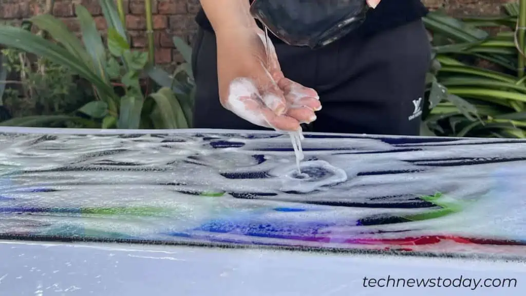 How to Clean a Mousepad 10 pour-water-into-mousepad-to-rinse-it-1024x576