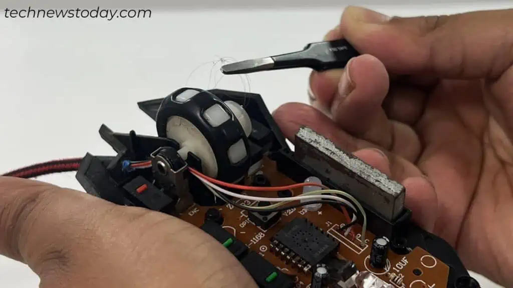 How to Clean a Mouse (Quick and Easy) 12 pull-out-hair-strands-and-fiber-from-mouse-1024x576