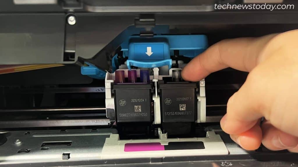 How to Change Ink in HP Printer? Step-by-Step Guide 5 removing-cartridge-from-printer