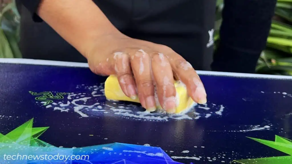 rub-mousepad-with-the-soap-to-clean-it-1024x576