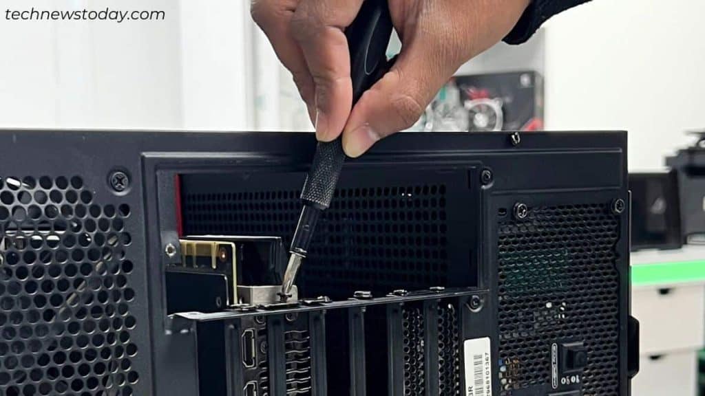 Does Your GPU Keep Crashing? Here's How to Fix It 2 tighten the graphics card with a screw