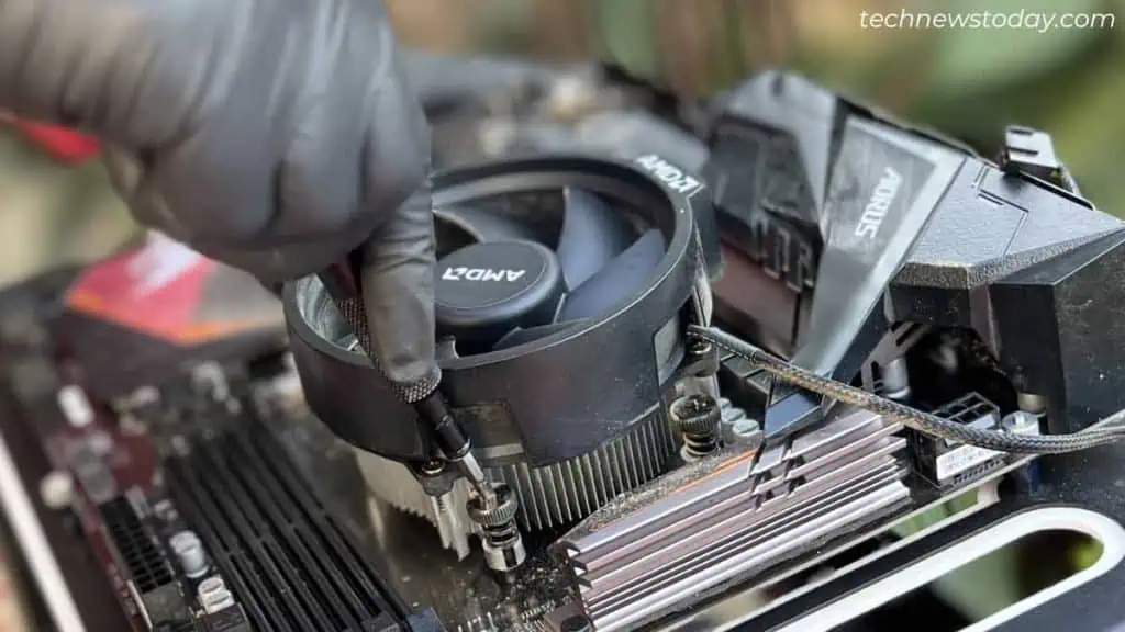 How To Clean A Motherboard 14 unscrew-cpu-fan-from-motherboard-1024x576