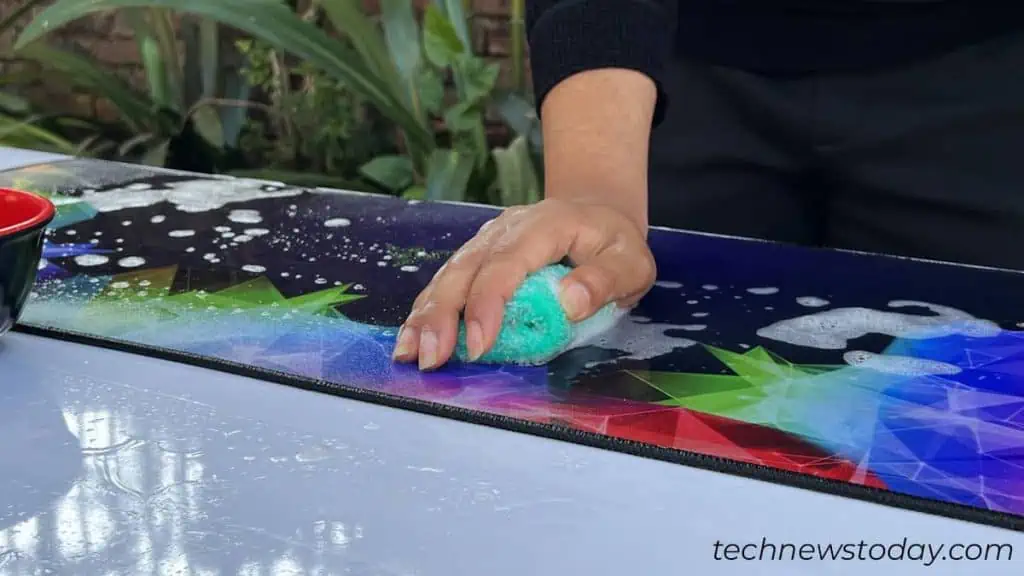 use-sponge-to-clean-a-mousepad-1024x576